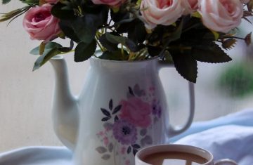 Roses in a Vase, a Book and a Cup of Coffee