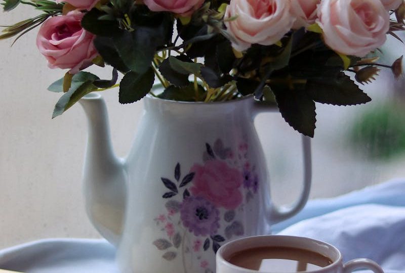 Roses in a Vase, a Book and a Cup of Coffee
