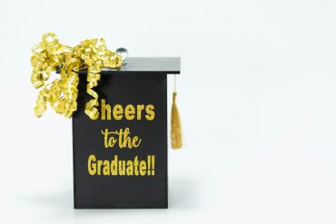 Black Graduation Cap on White Background